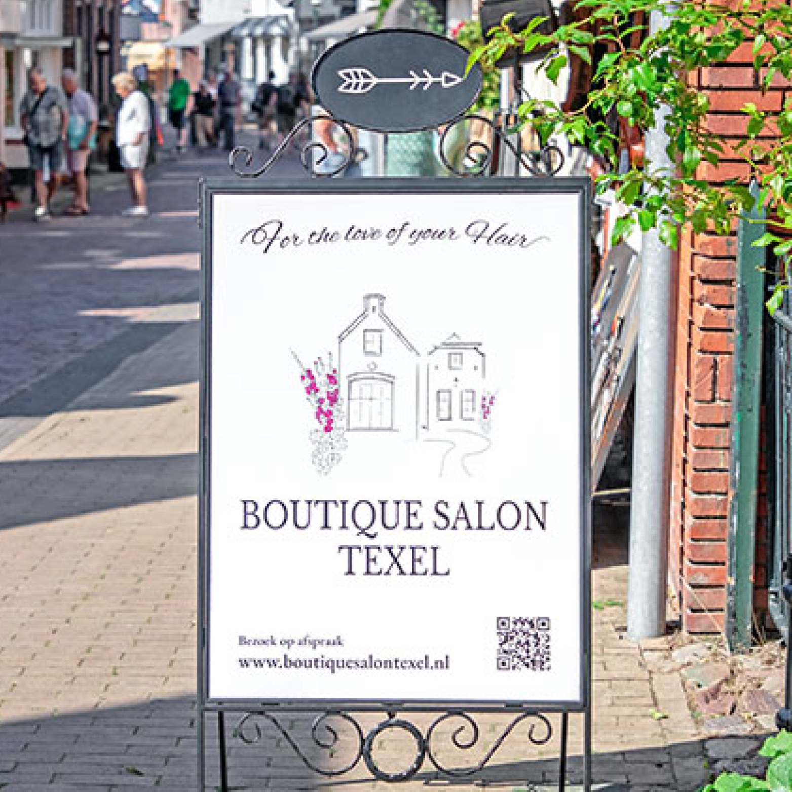 Reclame bord van Boutique Salon Texel